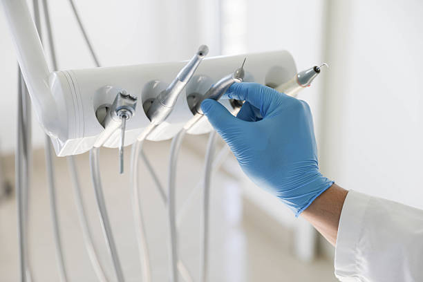 Professional Tooth Extraction technician working in Rossville, IN